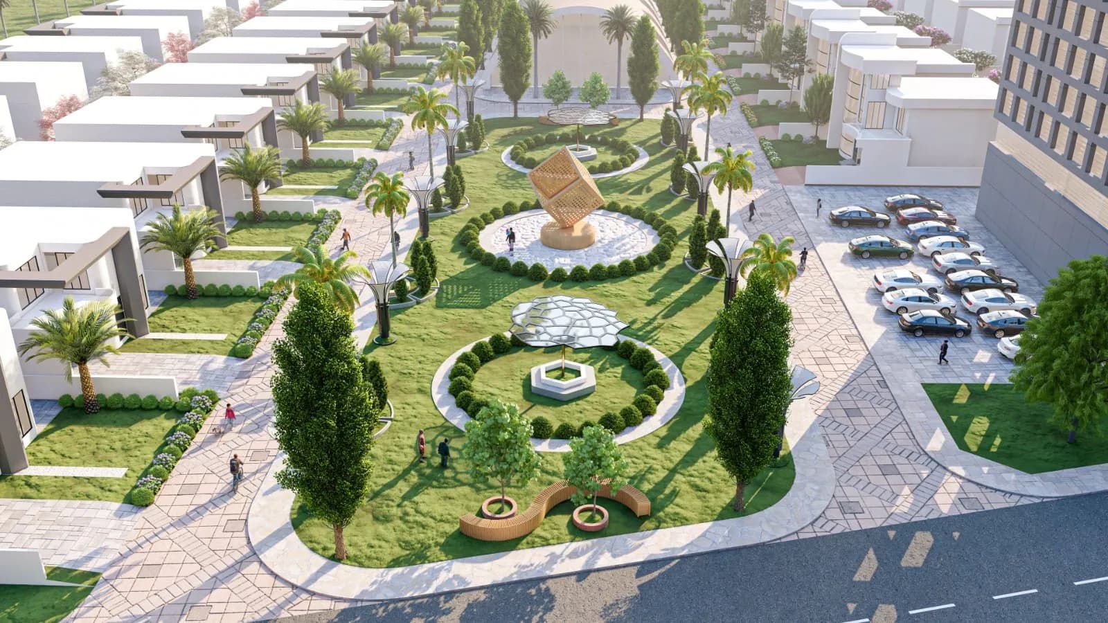Landscaped central park with a sculpture and walkways inside an Arrayhan estate